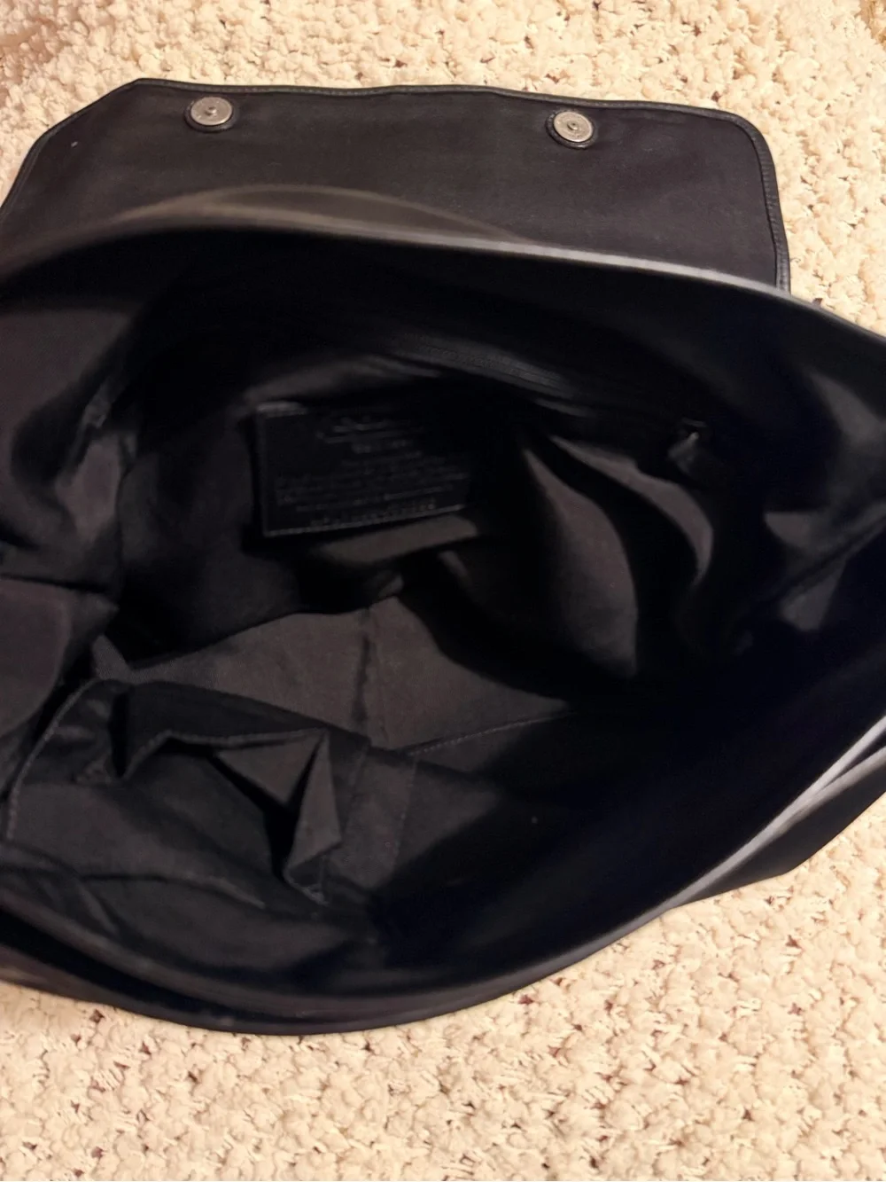 Coach sleek black